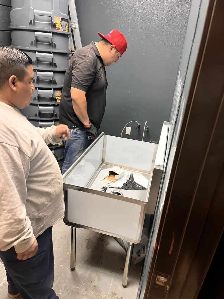 Commercial plumbing and sink installation in Legacy
